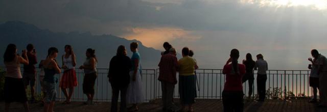 People standing around at Dusk